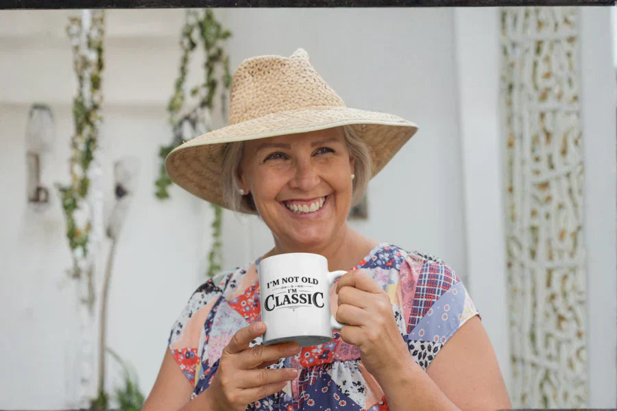 Smiling grandmother wearing a funny gift shirt from Lively Seniors